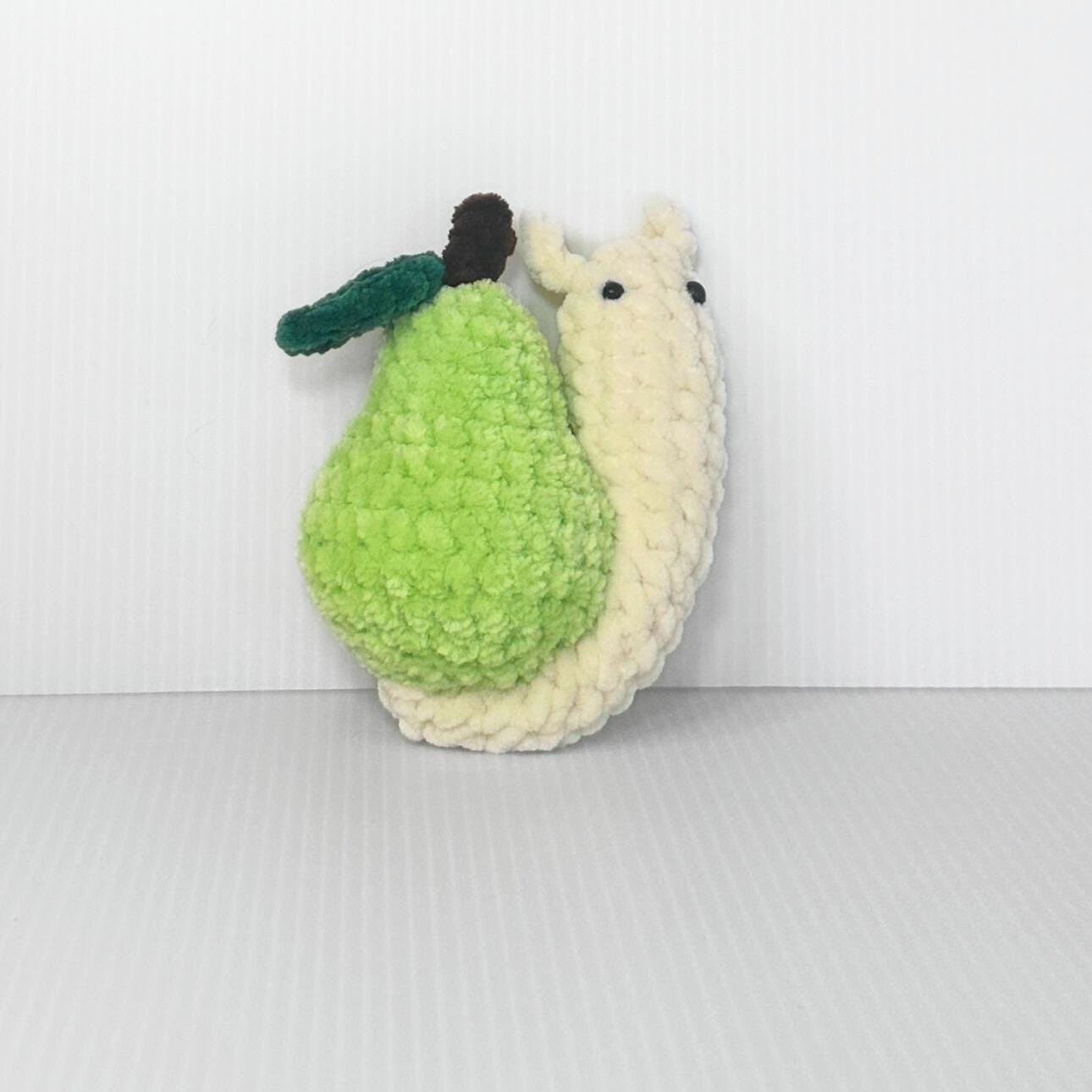 Crochet Fruit Snail Plushie Set: Handmade Whimsical Collection - pursuitofcraftyness