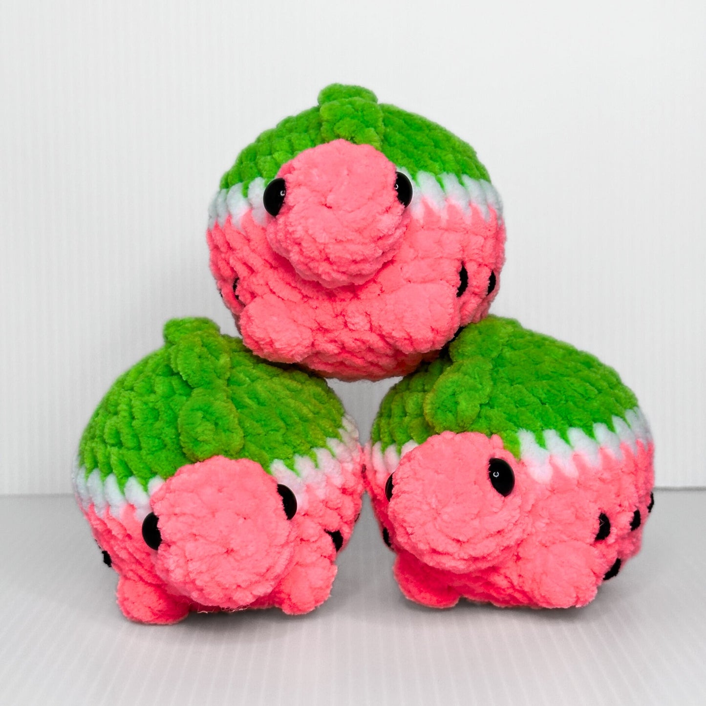 Handmade Melonasaurus Crochet Plush — Kawaii Watermelon Dinosaur in Pink and Green Chunky Yarn - pursuitofcraftyness