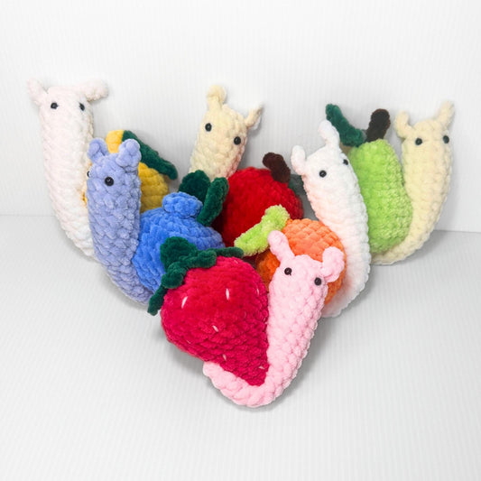 Crochet Fruit Snail Plushie Set: Handmade Whimsical Collection - pursuitofcraftyness