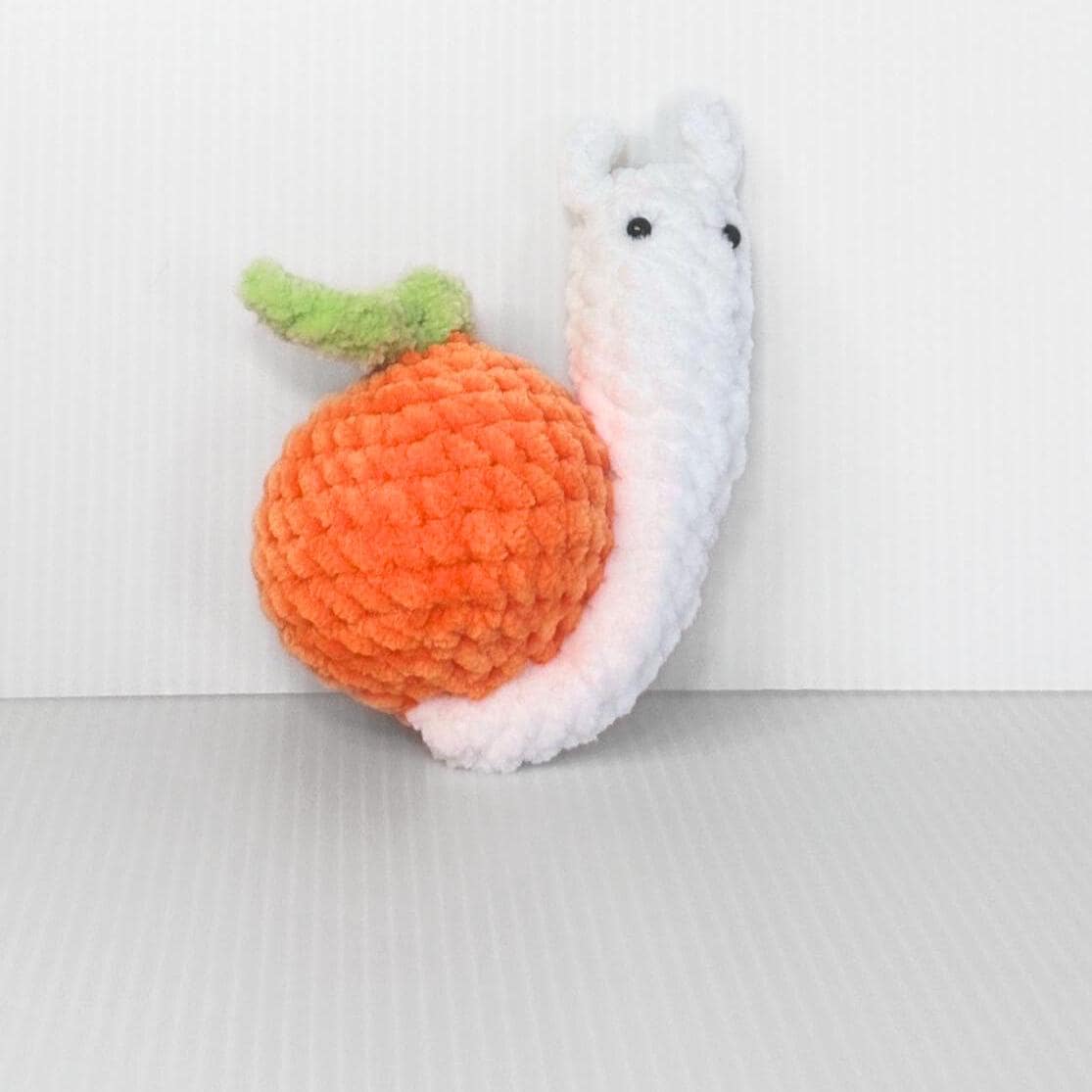 Crochet Fruit Snail Plushie Set: Handmade Whimsical Collection - pursuitofcraftyness