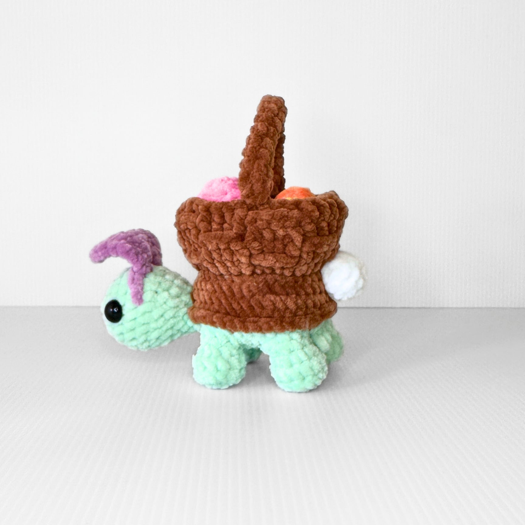 Handmade Crochet Easter Turtle Plushie with Basket and Eggs Spring Shelf Sitter Decor - pursuitofcraftyness