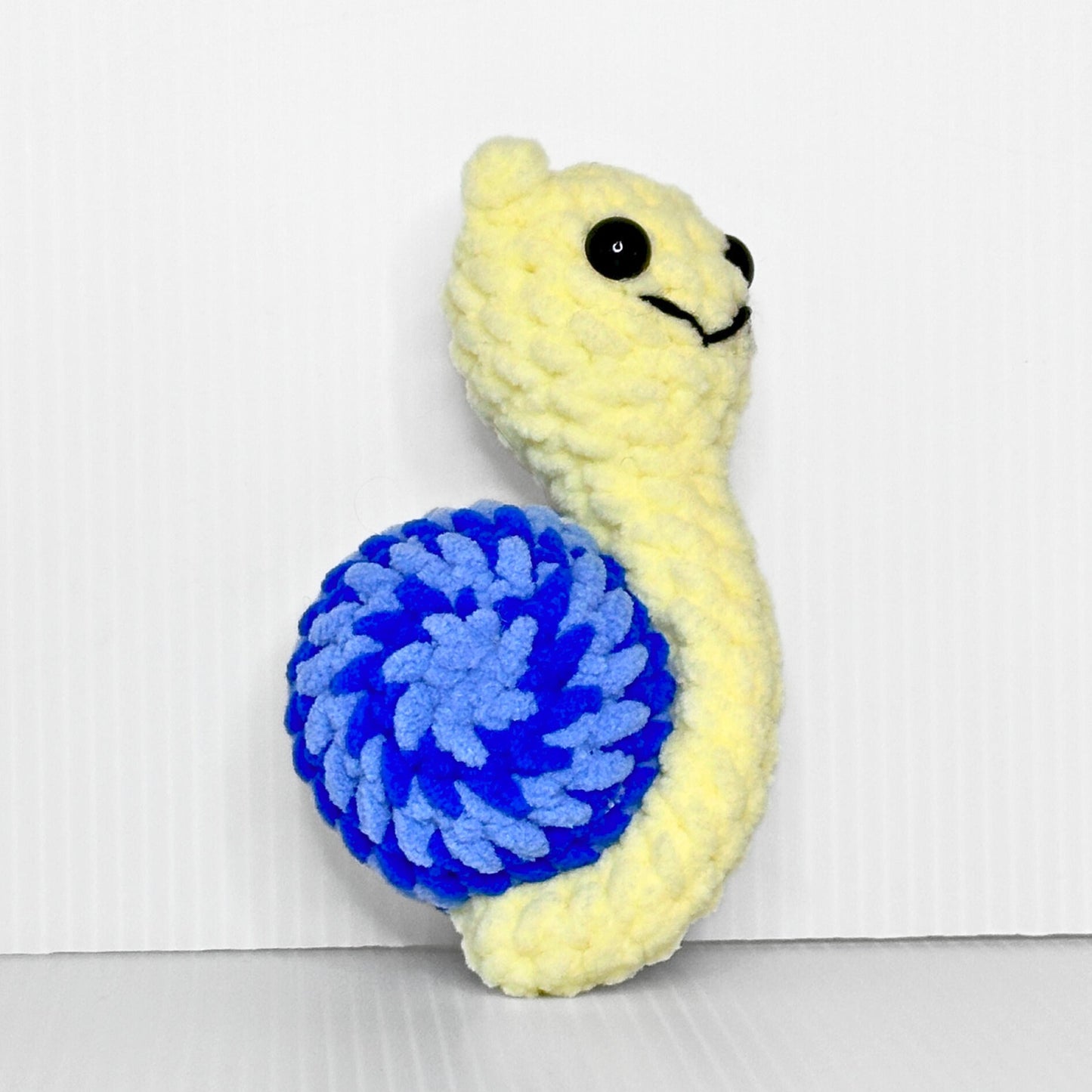 Handmade Disco Snail Crochet Plush — Kawaii Stuffed Snail with Colorful Swirl Shell, Choose Your Color - pursuitofcraftyness