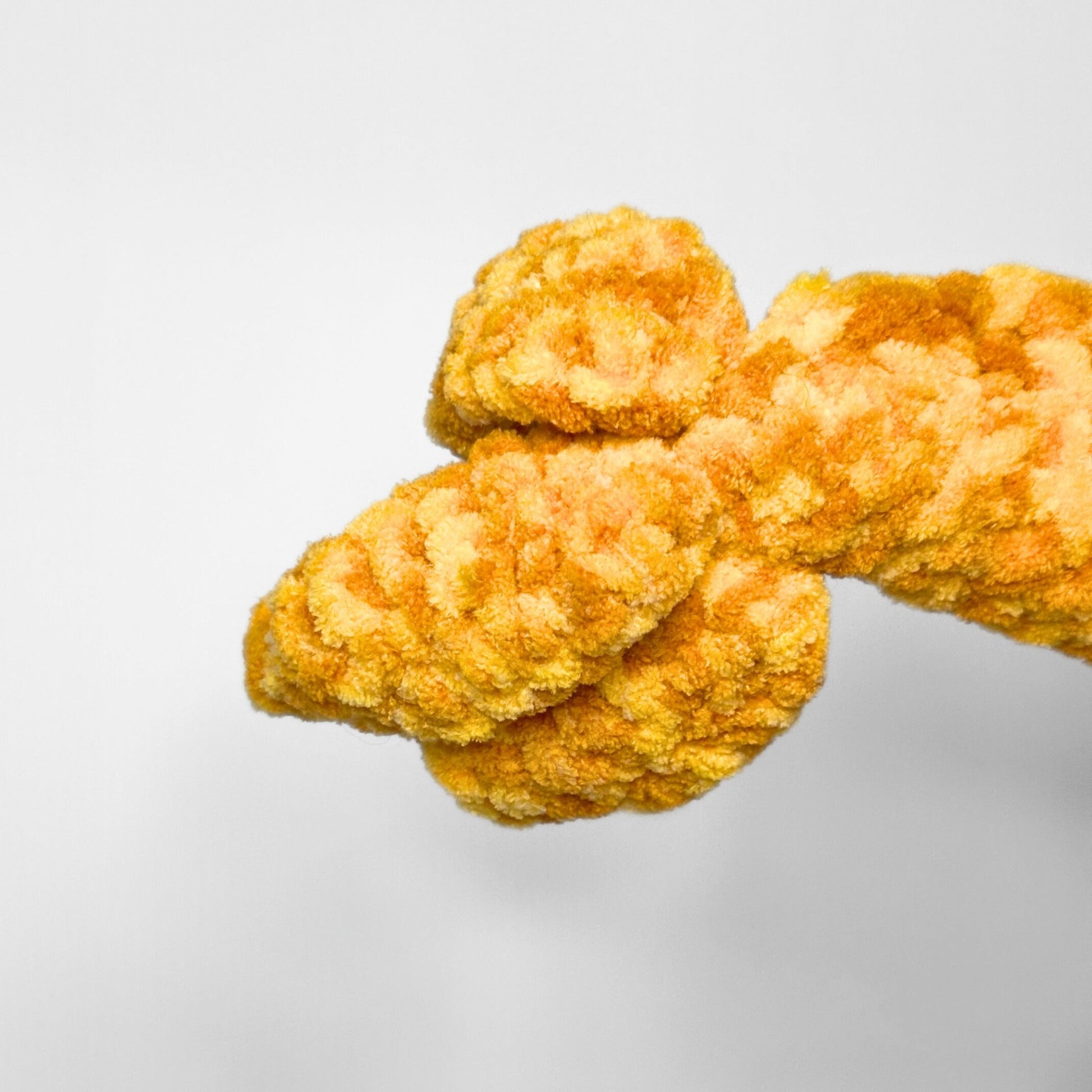 Handmade Golden Feathertail Dragon Crochet Plush — Large Laying Fantasy Dragon in Warm Gold Velvet Yarn - pursuitofcraftyness