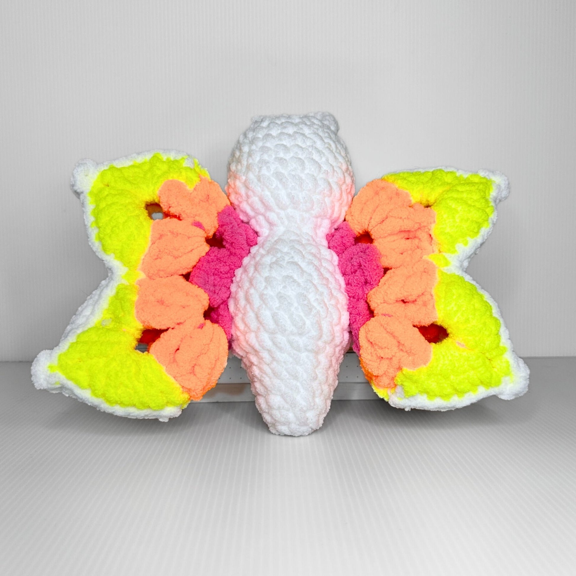 Handmade Granny Square Butterfly Crochet Plush — Neon Multicolor Patterned Wings in Chunky Yarn - pursuitofcraftyness