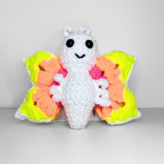 Handmade Granny Square Butterfly Crochet Plush — Neon Multicolor Patterned Wings in Chunky Yarn - pursuitofcraftyness