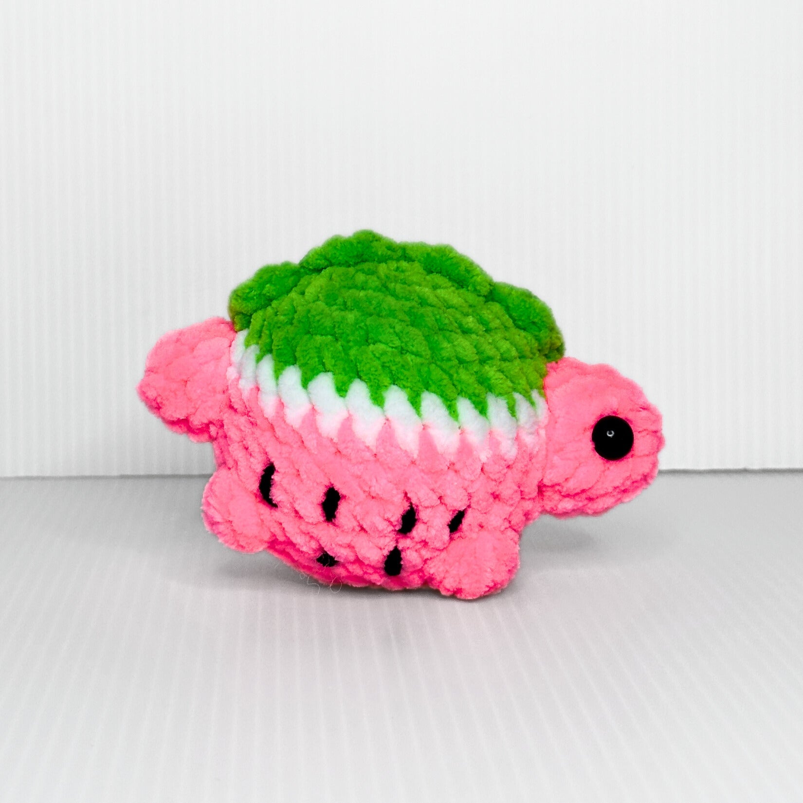 Handmade Melonasaurus Crochet Plush — Kawaii Watermelon Dinosaur in Pink and Green Chunky Yarn - pursuitofcraftyness