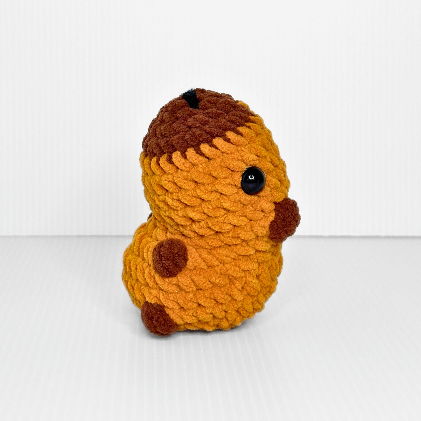 Handmade Sitting Capybara Crochet Plush — Kawaii Dark Amber Capy Stuffed Animal - pursuitofcraftyness
