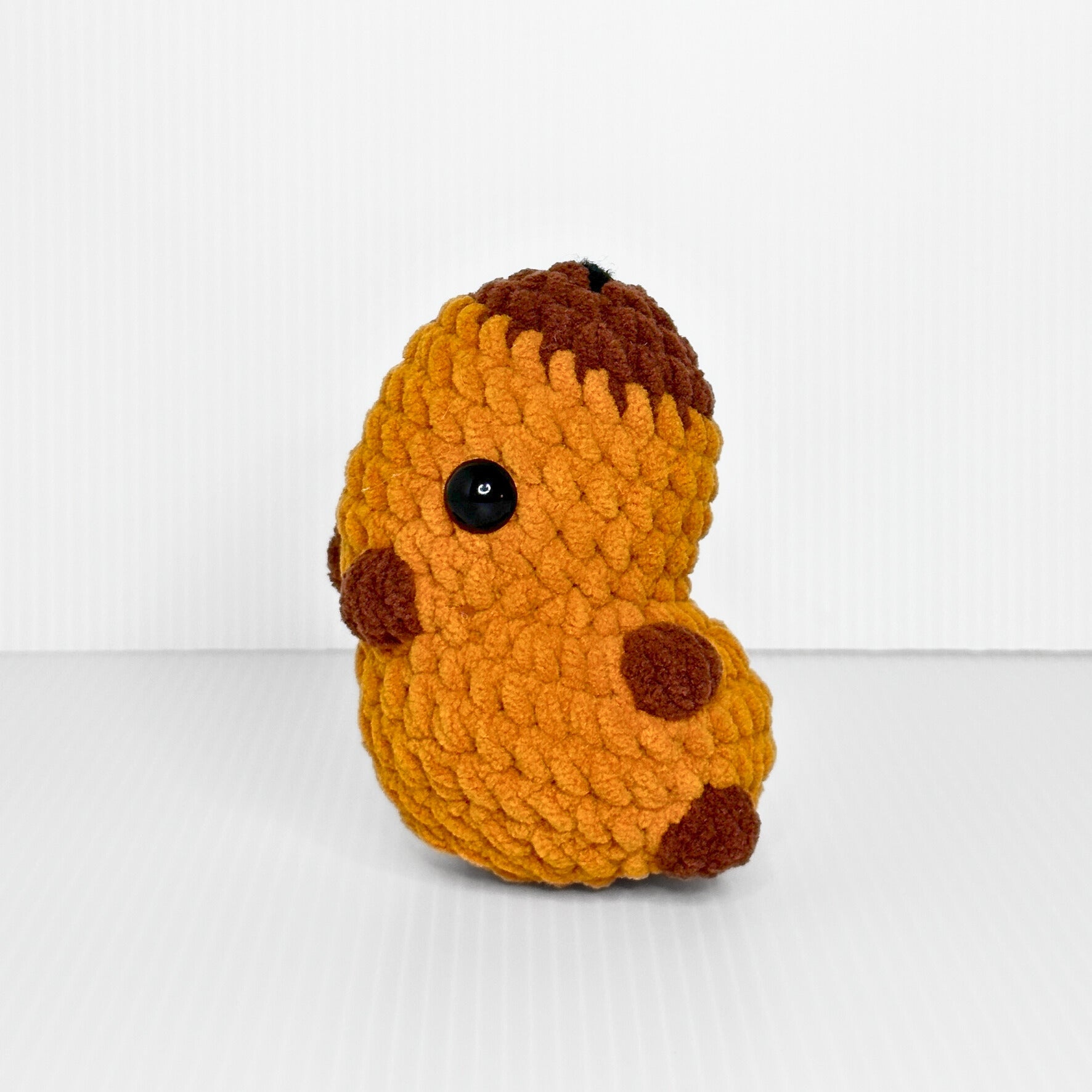 Handmade Sitting Capybara Crochet Plush — Kawaii Dark Amber Capy Stuffed Animal - pursuitofcraftyness