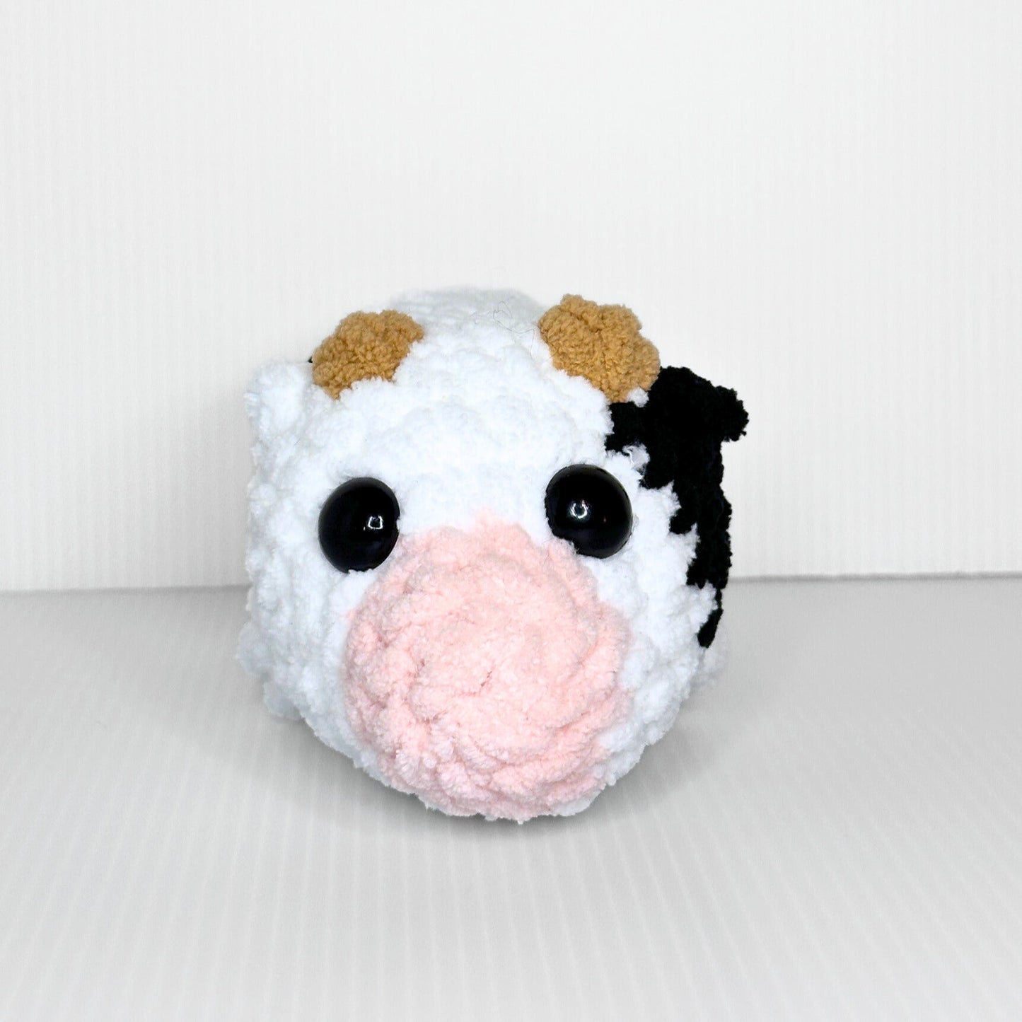 Handmade Sleepy Cow Crochet Plush — Laying Down Black and White Chunky Chenille Stuffed Animal - pursuitofcraftyness