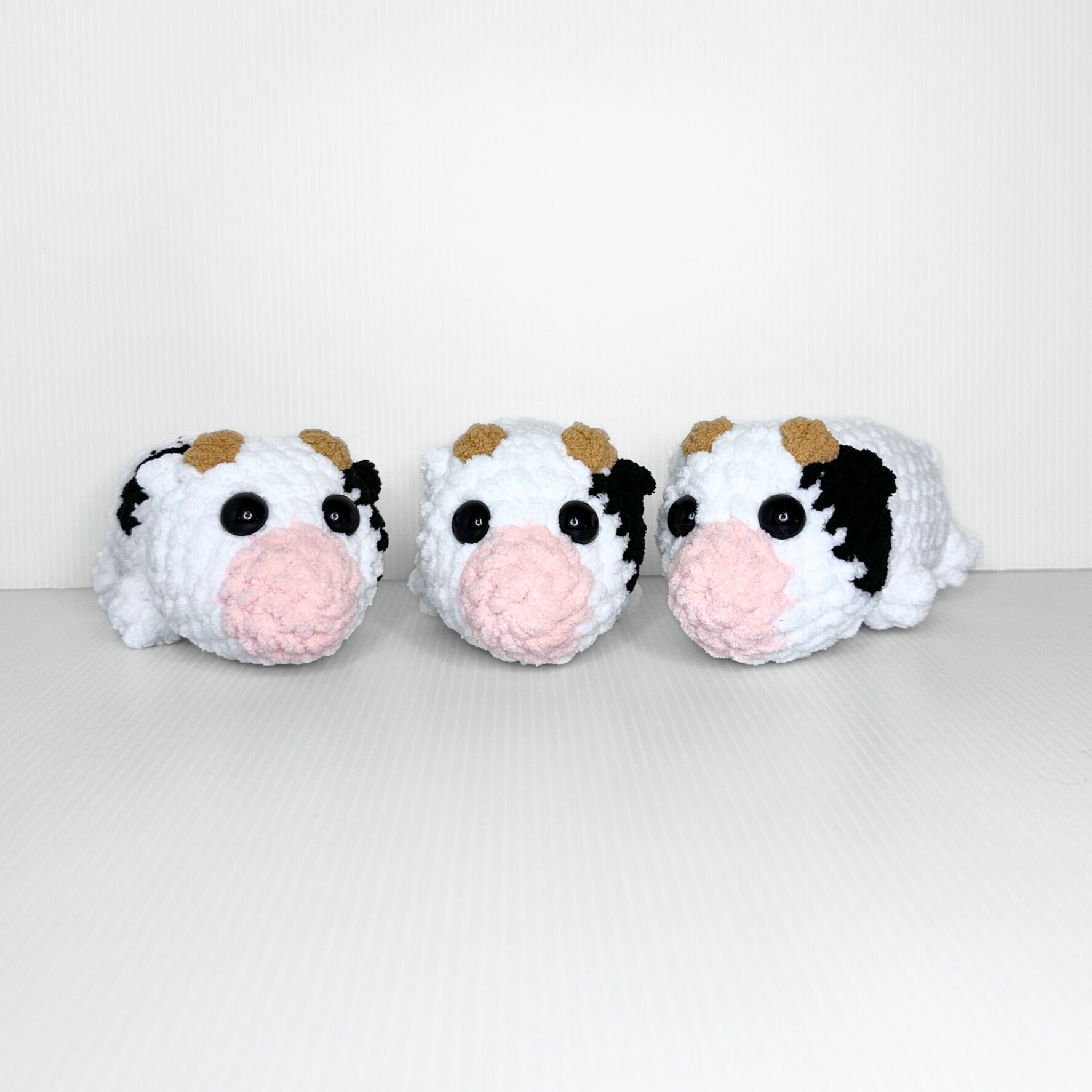 Handmade Sleepy Cow Crochet Plush — Laying Down Black and White Chunky Chenille Stuffed Animal - pursuitofcraftyness